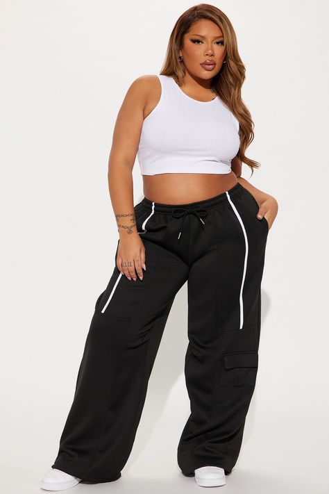 Available In Black/White And Cream/combo. Jogger Pant Elastic Waistband High Rise Drawstring Hand Pockets Cargo Pocket Stripe Stretch Wide Leg Adjustable Toggler Hem 30" Inseam Main Fabric: 100% Polyester Imported | Street Vibe Wide Leg Jogger Pant in Black/White size 1X by Fashion Nova Wide Leg Joggers Outfit, Black Jogger Pants, Joggers Outfit, Women Street, Black Joggers, Cargo Pocket, Black White Fashion, Jogger Pants, Fashion Nova