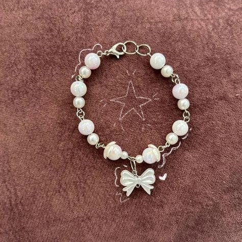 new beads drop - bow charm bracelet ♡ dm if interested ☆ + bracelets available Bow Charm, Charms Bracelets, Bow Bracelet, White Bracelets, White Bow, Handmade Jewelry, Charm Bracelet, Charms, Bracelet