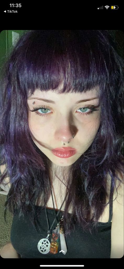 Dark Purple Hair Green Eyes, Dark Purple Hair Grunge, Purple Hair With Bangs Aesthetic, Dark Purple Hair Blue Eyes, Purple Egirl Hair, Black And Purple Color Block Hair, Purple Black Hair Short, Black And Purple Shag Hair, Black Purple Hair Short