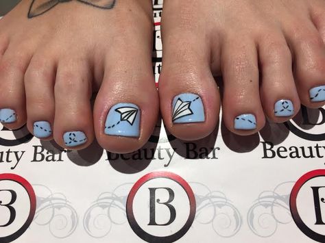 Whimsical paper planes hand drawn by Quynh.  www.beautybar-inc.com 719-473-8404 26 N. Tejon St. (downtown Colorado Springs)   #pedicure #nails #nailart #paperplane #bluenails #beauty #beautybar #salon #spa #coloradosprings Fall Nail Art Designs, Paper Planes, Paper Airplane, Fall Nail Art, Paper Airplanes, Toe Nail Art, Paper Plane, Pedicures, Fall Nail