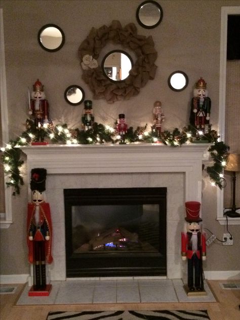 Christmas Nutcracker mantle Mantle Christmas Decor Ideas, Mantle Christmas, Primitive Christmas Decorating, Hanging Christmas Stockings, Nutcracker Decor, Nutcracker Christmas Decorations, Christmas Light Installation, Christmas Mantle Decor, Christmas Fireplace Decor