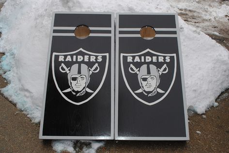 Painted Corn Hole Boards, Raiders Nation, Cornhole Boards Designs, Cornhole Designs, Board Paint, Custom Cornhole Boards, The Raiders, Cornhole Game, Board Designs