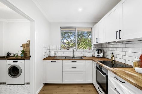 White Kitchen Wooden Benchtop, White Kitchen Timber Benchtop, White Cupboards Black Handles, Kitchen Wooden Benchtop, Bedsitter Ideas, Wooden Benchtop Kitchen, White Kitchen Bench, Timber Benchtop Kitchen, White And Timber Kitchen