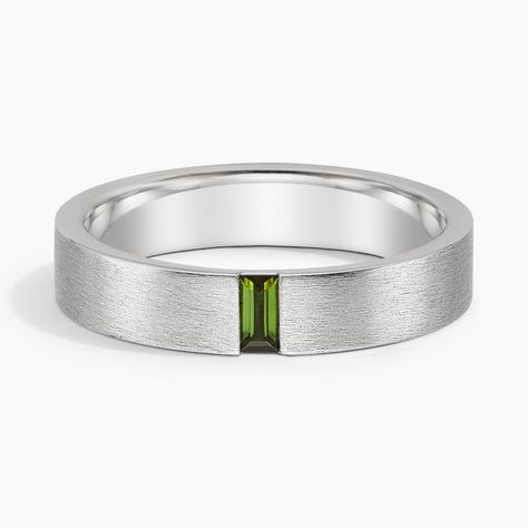 Men's 18K White Gold Apollo Green Tourmaline 4.5mm Wedding Ring. This modern wedding band features a vertical baguette green tourmaline set in a matte brushed finish for a defining look. The softened inside edge provides increased comfort for daily wear. Green Male Wedding Ring, Men S Wedding Band, Man Wedding Ring Silver, Silver Wedding Bands For Men, Men’s Engagement Rings, Male Wedding Bands, Male Wedding Rings, Wedding Band Guide, Ring Style Guide