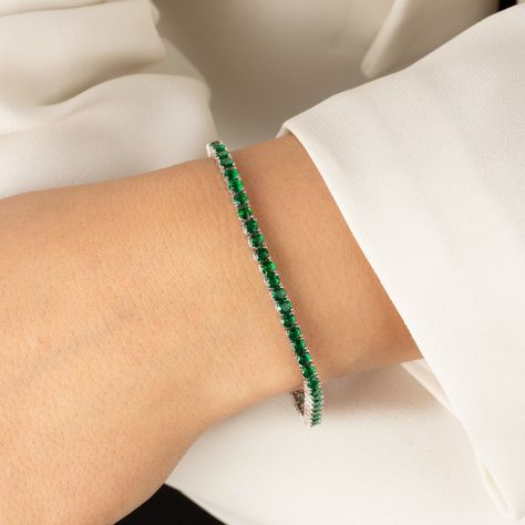 New in!! Green Emerald Tennis braceler perfect for everday wear.  Tennis bracelet made from sterling silver, and high grade emerald color cz stones. All of our products are carefully packaged. keep them in a box or separately in a plastic bag. so that sterling silver does not oxidize. you can clean the products with a soft polishing cloth. Avoid Chemicals. Tennis Bracelet Emerald, Green Emerald Bracelet, Emerald Tennis Bracelet, Silver Tennis Bracelet, Diamond Bracelet Design, Emerald Bracelet, Fine Diamond Jewelry, Emerald Color, Bracelet Design