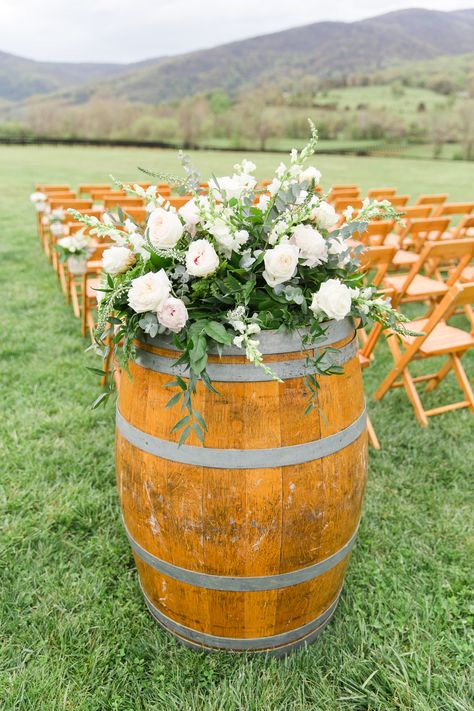 Wine barrel wedding ceremony decor for a winery wedding at King Family Vineyards | Rustic wedding ideas | Megan Rei Photography Flowers On Wine Barrel, Wine Barrel Arrangements Wedding, Barrel Arrangements Wedding, Wine Barrel Ideas Wedding, Wine Barrel Floral Arrangement, Barrel Flowers Wedding, Wine Barrel Flower Arrangements, Wine Barrel Flowers, Wedding Barrel