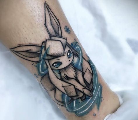 Glaceon tattoo by Cristian Carrion Eevee Tattoo Ideas, Eevee Tattoo Design, Glaceon Tattoo, Pokémon Tattoo Ideas, Vulpix Tattoo, Eeveelutions Tattoo, Gaming Tattoo Ideas, Pokemon Tattoo Ideas, Eevee Tattoo