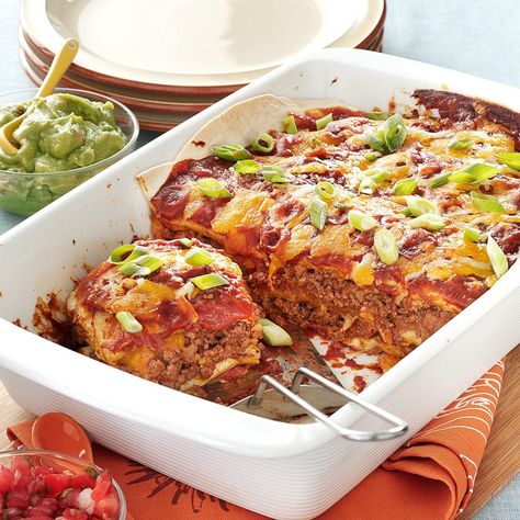 Pan Burritos Recipe -Our family loves Mexican food, so this flavorful, satisfying casserole is a favorite. It's nice to have a way to get the taste of burritos and be able to cut servings any size you want. —Joyce Kent, Grand Rapids, Michigan Pan Burritos, Steak Taco, Mexican Lasagna, Tortilla Strips, Meat And Vegetables, Saranac Lake, Healthy Beef, Burritos Recipe, Beef Casserole Recipes