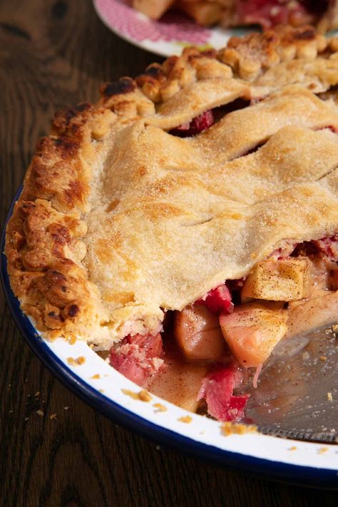 In this quintessentially English Apple and Rhubarb Pie, juicy Bramley apples and tart pink rhubarb snuggle together under a blanket of crisp pie crust pastry.Flavoured with ginger and cinnamon, it is everything a good fruit pie should be!