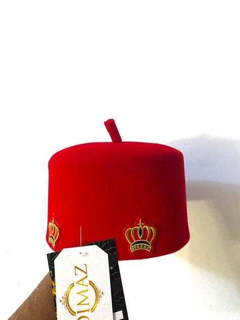 Igbo Culture, King Hat, Igbo Wedding, Eagle Feather, African Hats, African Outfits, Eagle Feathers, Handmade Stamps, Red Cap