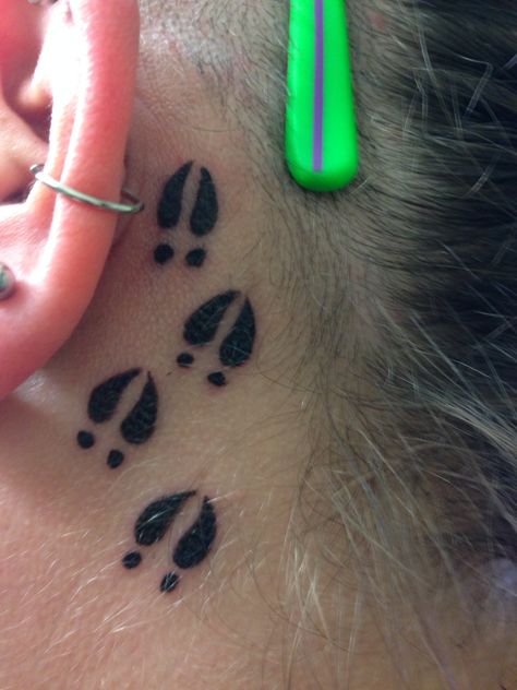 Hearing is the main sense you use when hunting so the deer tracks are behind my ear. Deer Hoof Tattoo, Deer Track Tattoo For Women, Deer Tracks Tattoo, Deer Print Tattoo, Deer Antler Tattoos Men, Dog Hunting Tattoo, Ear Tag Tattoo, Small Hunting Tattoos, Hunting Tattoos For Women