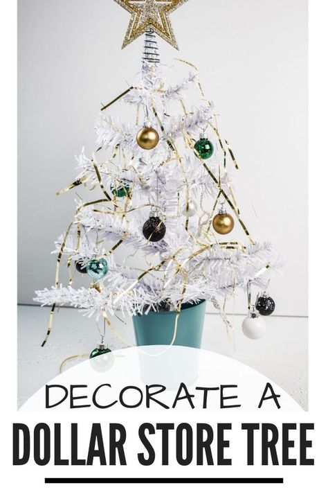 These mini Christmas trees from the dollar store are a fun and easy way to decorate tabletops, offices, and more! 15 talented bloggers and designers share their mini tree decor inspiration. White Dollar Tree Christmas Tree, Decorating Tiny Christmas Trees, Mini Christmas Tree Ideas, Christmas Tree Inspiration Simple, Mini White Christmas Tree, Office Christmas Decor, Mini Christmas Tree Decorations, Christmas Tree Decoration Ideas, Mini Christmas Trees