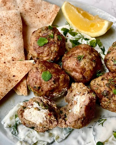 Feta-Stuffed Lamb Meatballs Recipe | Kitchn Lamb Meatballs Greek, Oven Baked Meatballs, Lamb Dinner, How To Cook Lamb, Greek Meatballs, Greek Seasoning, Lamb Meatballs, Mint Sauce, Tzatziki Sauce