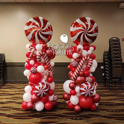 Christmas Balloon Staircase, Christmas Balloon Arch Diy, Christmas Balloon Pillars, Balloon Candy Canes, Christmas Wood Backdrop Ideas, Candy Cane Balloon Columns, Red And White Balloon Columns, Candy Cane Christmas Party Decorations, Balloons Christmas Decorations