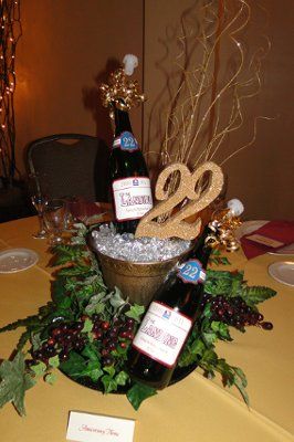 Wine Bucket Centerpiece, Bucket Centerpiece Ideas, Wine Centerpiece, Champagne Centerpiece, Wine Birthday Party, Bucket Centerpiece, Anniversary Centerpieces, Mardi Gras Centerpieces, Wine Bottle Centerpieces