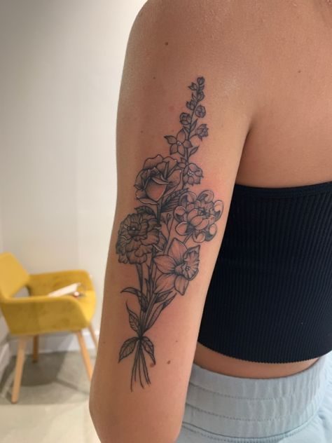 Wildflower Cluster Tattoo, Placement Of Flower Tattoo, Upper Arm Birth Flower Tattoo, Puzzle Piece Flower Tattoo, Flower Bouquet Tattoo Upper Arm, Large Flower Bouquet Tattoo, Large Bouquet Tattoo, Birth Flower Tattoos Shoulder, Mixed Flower Bouquet Tattoo