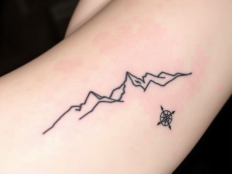 Consider a tattoo design of a line drawing mountain range with a small compass in the corner to symbolize exploration and adventure. Line Drawing Mountain, Compass Tattoos, A Tattoo Design, A Line Drawing, Tattoo Tattoo, Tattoo Idea, Mountain Range, Compass Tattoo, A Tattoo