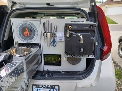 I want to create my own camp kitchen slide out for my Kia Soul. I can totally live off grid in this vehicle! Kia Soul Camping, Tailgate Kitchen, Kia Car, Car Life, Camping Vibes, Camping Kitchen, Camping Glamping, Camper Conversion, Camp Kitchen