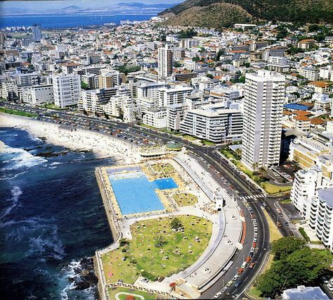 The Olympic swimming pool at Sea Point Pavilion from the air, Cape Town, South Africa, 1985, photograph by Etienne du Plessis. Olympic Swimming Pool, South Africa Travel Guide, Africa Travel Guide, Sea Point, Du Plessis, Olympic Swimming, South Africa Travel, Cape Town South Africa, Western Cape