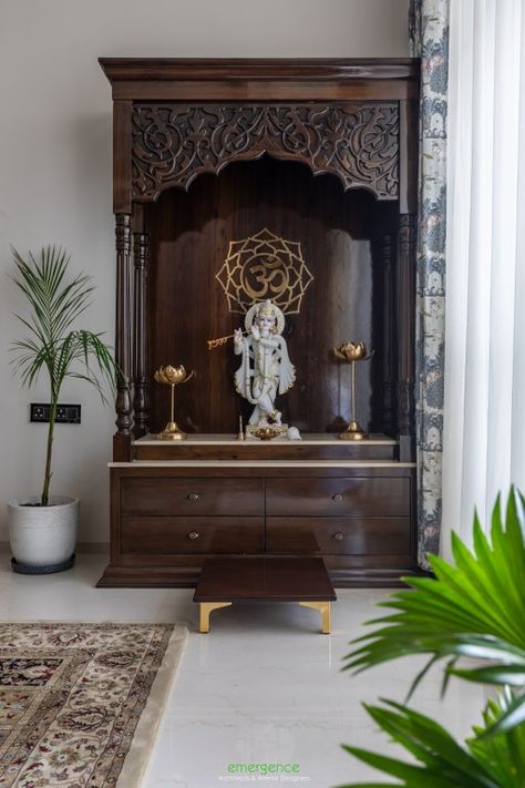 Warmth & Luxury curate this Contemporary Living Space in Indore | Emergence Architects - The Architects Diary Temple In Dining Room, Interior Design For Mandir, Contemporary Pooja Room, Interior Pillars, Temple Ideas, Krishna Mandir, Wooden Temple For Home, Wooden Temple, Mandir Design