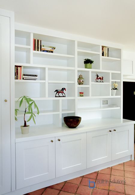 Contemporary styled Cupboards with asymmetrical shelving Cupboard Living Room, Living Room Cupboards, Built In Shelves Living Room, Living Room Wall Units, Living Room Built Ins, Living Room Furniture Layout, Built In Cupboards, Bedroom Cupboard Designs, Home Library Design