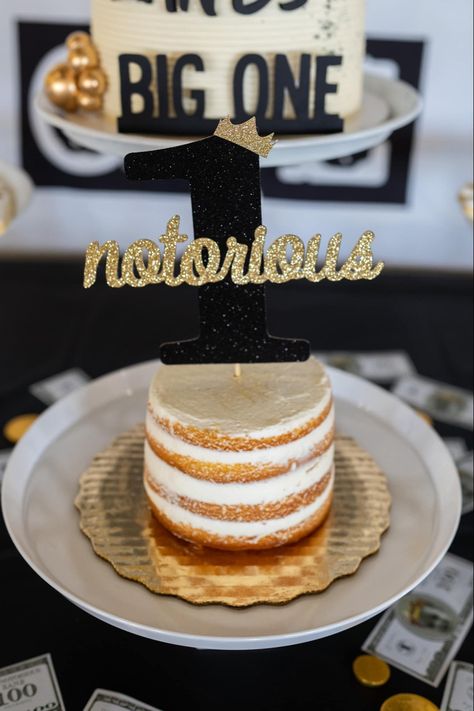 Biggie Smalls themed first birthday — Smash cake from Publix, Cake topper from Etsy #birthday #1stbirthday #biggie #diybirthdaydecor #notoriousone #smashcake #bigone Notorious Big One Smash Cake, Notorious One Smash Cake, Biggie Smalls First Birthday Party Cake, Notorious One Cake, Publix Cake, One Birthday Theme, Notorious One, 1st Birthday Smash Cake, Brunch Board