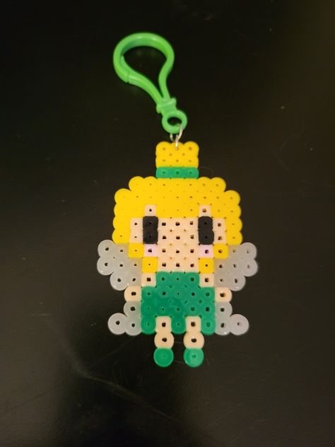 Disney tinkerbell keychain art design made of perler beads Perler Beads Tinkerbell, Tinkerbell Perler Bead Patterns, Mini Fuse Beads Ideas, Perler Bead Keychain Ideas, Disney Beads, Perler Bead Keychain, Hama Beads Disney, Pony Bead Projects, Hamma Beads Ideas