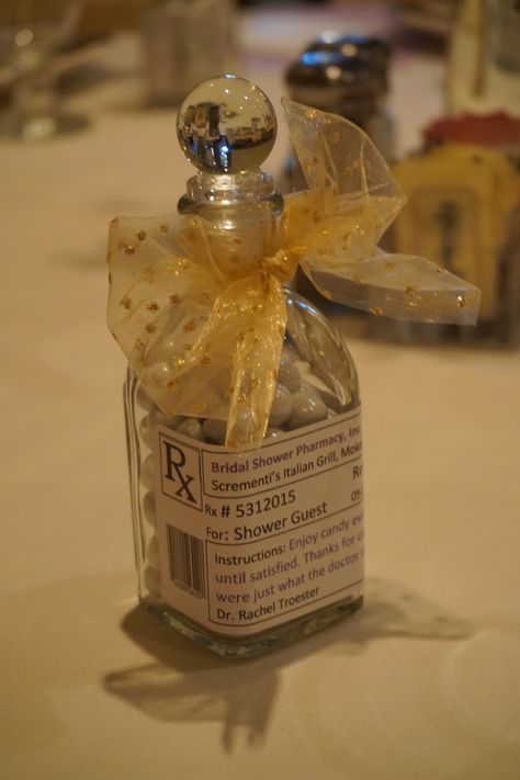 Medical-themed wedding shower gift: apothecary glass jar with white Sixlets candy and prescription label. Great thank you gift! Medical Themed Wedding Favors, Doctor Wedding Ideas Medical, Medical Wedding Theme, Pharmacist Wedding, Medical Wedding, Doctor Wedding, Nurse Wedding, Reception Theme, Doctor Party