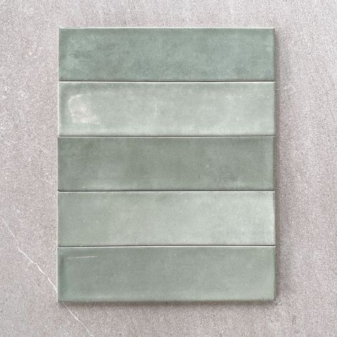 Sage Green Tiled Bathrooms, Bathroom Sage Tiles, Green Bathroom Feature Wall, Natural Green Bathroom, Sage Tiles Kitchen, Sage Green Herringbone Tile Bathroom, Green Kitchen With Brick Backsplash, Sage Green Tile Shower Ideas, Sage Green Tile Kitchen