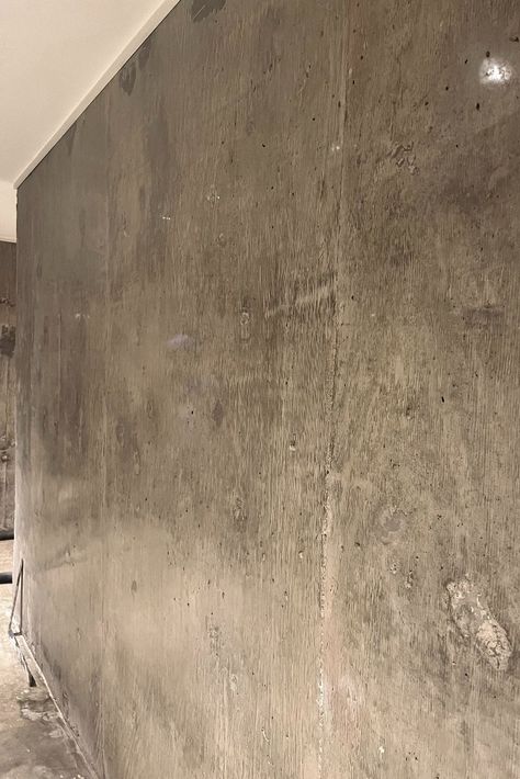 We love board formed polished concrete walls! Adorning a basement from 1972, these industrial polished walls add a modern energy and bring the space to life. Exposed Concrete Wall Basement, Polished Concrete Walls Interiors, Polished Concrete Basement, Polished Concrete Wall, Concrete Walls Interior, Concrete Basement Walls, Concrete Basement Floors, Coloured Walls, Concrete Basement