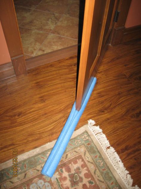 We like to leave the windows open in our bedroom during the cool months but don't want that cool air invading the rest of the house. This is the easiest door sweep, and it seals just fine. Buy one of... Uses For Pool Noodles, Draft Stopper Diy, Homemade Door, Pool Noodle Crafts, Door Sweeps, Door Sweep, Door Draught Stopper, Door Draft, Pool Noodle