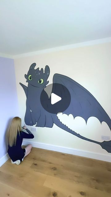 Jamie Jo Art on Instagram: "I designed a storybook style Toothless to paint on my wall 🎨 I love How to Train Your Dragon! And I have always wanted to do this in our cat’s room 🐾 #httyd #howtotrainyourdragon #toothless #interiordesign #homedecor #painting #acrylicpainting #dailyart #totoro #anime #animation" Dragon Theme Bedroom, Httyd Bedroom Ideas, How To Train Your Dragon Room Decor, How To Train Your Dragon Room, How To Train Your Dragon Room Ideas, Nursery Room Wall Painting, Kid Bedroom Paint Ideas, Httyd Nursery, How To Train Your Dragon Bedroom