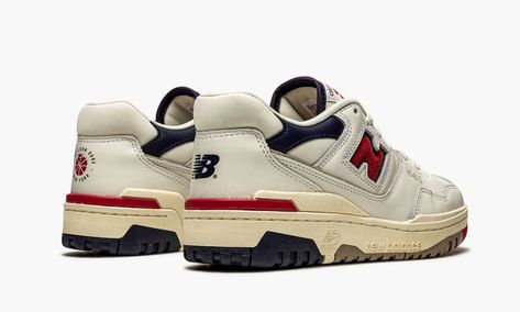 The Aimé Leon Dore x New Balance 550 “White/Navy-Red” is an April 2021 collaboration between Teddy Santis’s New York based streetwear brand and New Balance.  Debuting in 1989 as part of New Balance’s basketball collection, the 550 was never worn exclusively by one player or tied to any specific memorable moments in the NBA.  The shoe would become phased out and mostly forgotten until Aimé Leon Dore worked with New Balance to re-release and reinvigorate it in 2020.  The retro design displays a sm 550 Aime Leon Dore, Teddy Santis, New Balance 550 White, Trendy Shoes Sneakers, Streetwear Shoes, Aime Leon Dore, Shoe Wishlist, Funky Shoes, Cute Sneakers