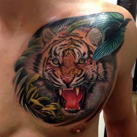 Chest Tattoos - worldareg.com Tiger Stripe Tattoo, Realistic Tiger Tattoo, Animal Tattoo Meanings, Tiger Tattoo Meaning, Mens Tiger Tattoo, Stripe Tattoo, Tiger Head Tattoo, Catrina Tattoo, Tier Tattoo