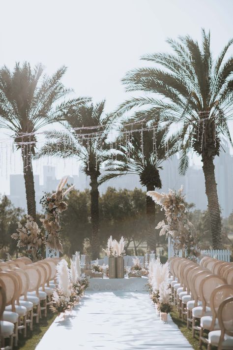 Whimsical Dubai Outdoor Wedding - Jumeirah & Emirates Golf Club with Persian Wedding Sofreh decor inspiration Dubai Wedding Venues, Boho Chic Wedding Ceremony, Chic Wedding Ceremony, Whimsical Outdoor Wedding, Uae Wedding, Wedding In Dubai, Wedding Themes Outdoor, Wedding Dubai, Pampas Wedding