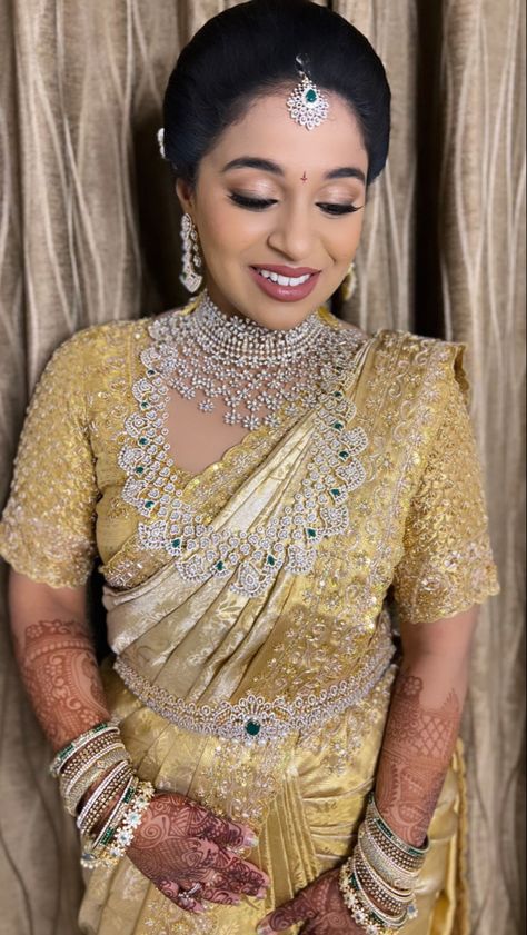 Bridal makeup with fresh glowing skin & sultry bronze eyes in a golden saree paired with diamond jewellery Saree With Diamond Jewellery, South Indian Bride Jewellery, Saree Ceremony, Indian Brides Jewelry, Magam Work Designs, Magam Work, Reception Saree, Golden Saree, Bride Hairstyle