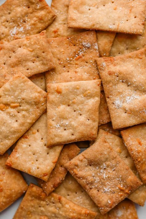 These are the cheesiest, crisp sourdough crackers you will ever have! Once you try these sourdough cheese crackers, you’ll never want to do anything else with your sourdough starter discard. Enjoy these crunchy, flaky crackers with fresh fruit and salted meats for a perfect snack. #cheese #crackers #sourdough Discard Crackers, Cheese Cracker Recipe, Sourdough Crackers, Pita Crackers, Sourdough Starter Discard, Heathy Snack, Cheddar Crackers, Vegetarian Meal Prep, Dough Recipes