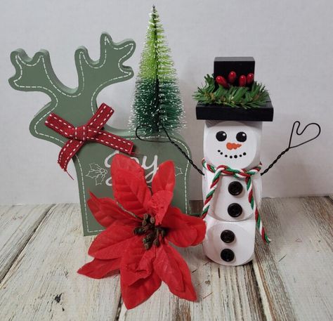 Today’s project is a wood snowman cube made from solid wood cubes stacked and glued together. The top hat was made from a smaller wood block and three-dollar tree Jinga blocks glues together. Diy Wood Snowman, Snowman Blocks, Diy Magnolia Wreath, Faux Christmas, Wood Snowman, Christmas Berries, Diy Snowman, Magnolia Wreath, Wooden Cubes