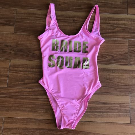 It's Wedding Season! Swimsuit: 82% Nylon, 18% Spandex Lining: 88% Polyester, 12% Spandex Get Ready For Your Bachelorette Party With This Sexy Bride Squad Swimsuit. Please Note: Items Are Sold Separately. Bride Squad Swimsuit, Squad Swimsuit, Pink Bride, Bride Squad, Wedding Season, Bachelorette Party, Womens Swim, One Piece Swimsuit, Bathing Suits