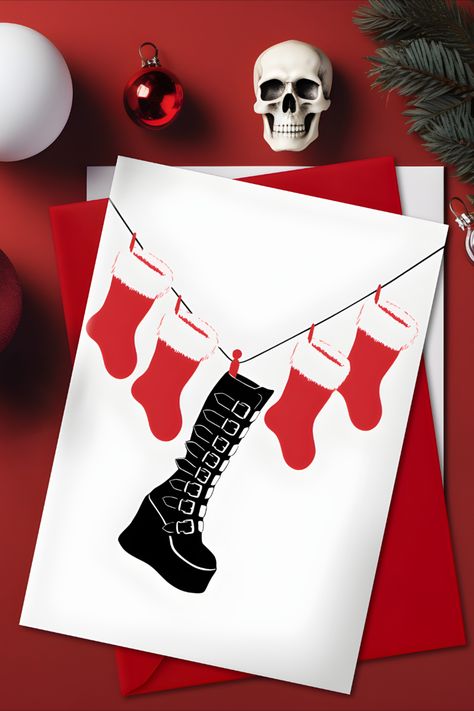 a glossy white alternative christmas card with a black demonia-style gothic platform boot hanging from a string of red santa stockings. Goth Xmas, Gothic Christmas Drawing, Goth Christmas Drawings, Goth Christmas Art, Goth Christmas Card, Unique Christmas Cards, Santa Stocking, Spooky Decor, Holiday Wishes