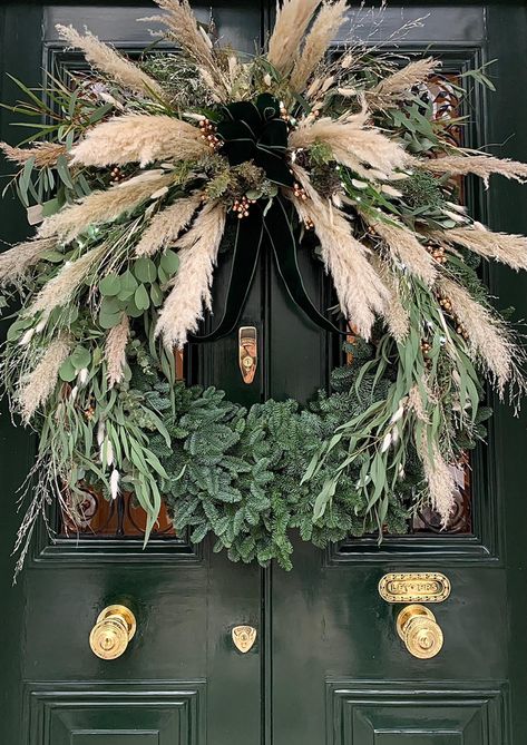 Fresh flower wreath made with leafy greenery and pampas grass, finished with stunning rich green ribbon. Green And Pampas Wreath, Christmas Wreath With Pampas, Pampas Grass Christmas Wreath, Pampas Christmas Decor, Fresh Flower Wreath, Christmas Mantelpiece, Pampas Wreath, Pampas Grass Wreath, Grass Wreath