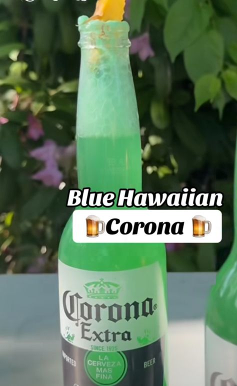 2oz White Rum ~ 2oz Pineapple juice ~ 1oz Blue curaco ~ 1oz cream de coconut blended and then poured into half a bottle of corona Drinks Recipe, Alcholic Drinks, Cocktail Drinks Alcoholic, Cocktail Ideas, Gin Drinks, Yummy Alcoholic Drinks, Boozy Drinks, Rum Drinks, Drinks Alcohol