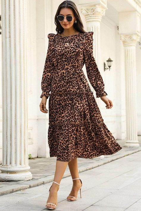 DETAILS: Sizing: Fitted Pattern: Leopard Features: Long sleeve, ruffle shoulder, tiered, elastic cuff Neckline: Crewneck Stretch: No Product measurements: S: bust 37 in, length 48 in, sleeve 23 in, shoulder 15 in, waist 25-38 in M: bust 38 in, length 49 in, sleeve 24 in, shoulder 15 in, waist 27-39 in L: bust 41 in, length 50 in, sleeve 24 in, shoulder 16 in, waist 29-41 in XL: bust 43 in, length 50 in, sleeve 25 in, shoulder 16 in, waist 32-44 in Material composition: 100% polyester Care: Machi Leopard Print Maxi Dress, Leopard Print Fabric, Tiered Ruffle Skirt, Ruffle Long Sleeve, Round Neck Dresses, Leopard Dress, Crewneck Dress, Leopard Print Dress, Mid Length Dresses