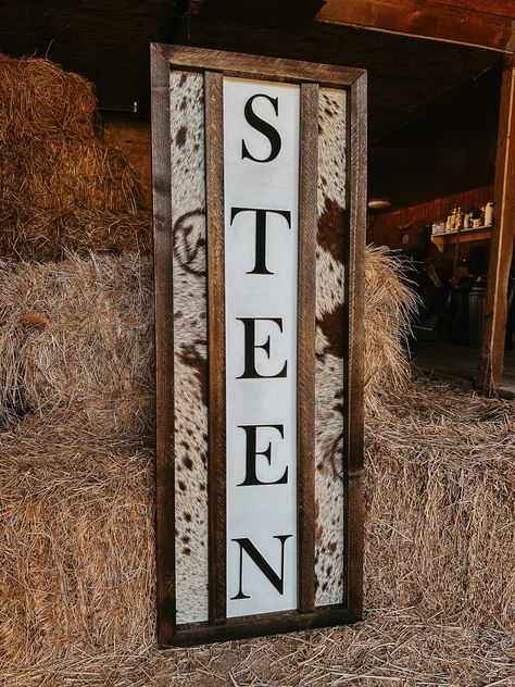 Handmade western sign! Perfect for the porch or entry way! You can customize with whatever you would like it to say in the personalization box. They are meant to have a one word phrase on them. If you are wanting somehting with more wording, please see my other listings.  You can choose cowhide or aztec material, just add that to the order notes.  Keep in mind, these are completely handmade by a small business. we have higher order volumes which lead to longer processing times.  Processing times Boho Western Office, Western Themed House, Western Wooden Signs, Western Front Porch Signs, Cowboys Porch Sign, Western Signs For Bedroom, Western Farmhouse Decor, Family Western Sign, Western Last Name Signs