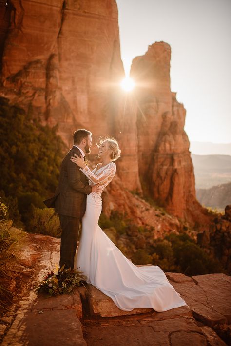 The bride and groom laugh together as they stand with the sun peaking through the red rock features behind them. Learn more about planning your own Sedona Elopement! Sedona Elopement, Arizona Adventure, Best Places To Elope, Cathedral Rock, Places To Elope, Top Pic, Sedona Wedding, Rock Wedding, Elopement Ceremony