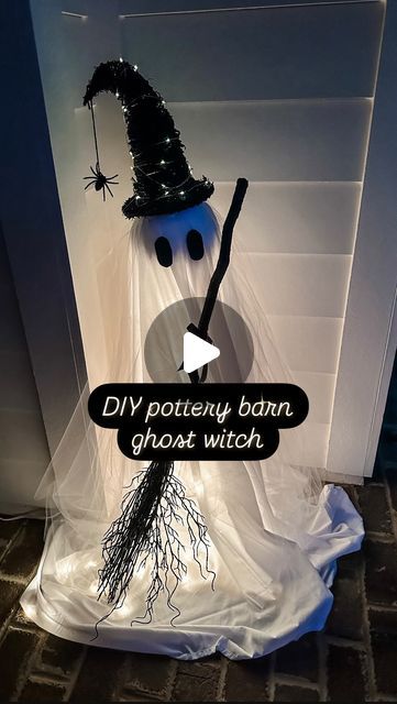 Marissa Lynn Fidler on Instagram: "DIY Pottery Barn Ghost Witch 👻 TAP FOLLOW @fidlinaroundhome for holiday and seasonal ideas!

Comment “DIY” below and I’ll send you the exact products I used to create this beaut!! 

Whatever shall we name her?! 🧐 give me your best names below!

STEP BY STEP “how to” below 👇🏻

1) Grab a 36” tomato cage and secure the ends with a rubber band or zip tie

2) Stick a styrofoam ball on top for the head

3) Wrap white lights around the tomato cage (I used 100 warm white lights)

4) Throw a white twin bed sheet over top then layer with white tulle 

5) Cut two eye balls out of black adhesive felt and stick onto face (over tulle)

6) Using black yarn, tie a small spider from the end of a witch hat (I got my hat and spider from @michaelsstores)

7) Secure the h White Twin Bed, Best Names, Eye Balls, Ghost Diy, Hat Diy, Warm White Lights, Ghost Witch, Witch Diy, Tomato Cages