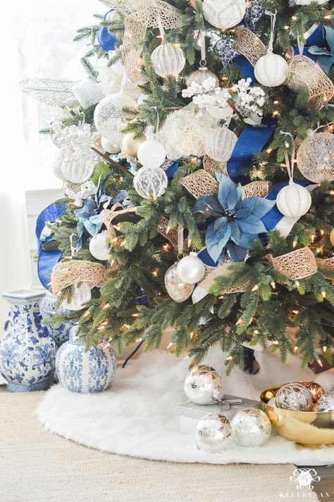 blue-white-and-gold-christmas-tree-with-fur-skirt Ideas Decoracion Navidad, Blue Christmas Tree Decorations, White Christmas Tree Ideas, Blue Christmas Decor, Silver Christmas Decorations, Blue Christmas Tree, Silver Christmas Tree, Gold Christmas Decorations, White Christmas Trees