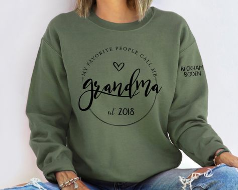 Personalized Grandma,Custom Pocket and Sleeve Sweatshirt,Personalized Grandma Crewneck, Grandmother Sweatshirt with Kids Name,Mom Sweatshirt by JinxeyDesigns on Etsy Great Grandma Sweatshirt Ideas, Grandma Vinyl Shirt, Grandma Sweatshirt Ideas, Grandma Sweatshirts With Grandkids Names, Grandparents Sweatshirt, Grandma Sweatshirt, Idee Cricut, Mom Sweater, Personalized Grandma