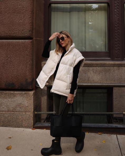 White Puffer Vest Outfit Street Style, Lv Easy Pouch On Strap Outfit, White Vest Puffer Outfit, Creme Puffer Vest Outfit, White Gilet Outfit, White Long Sleeve Bodysuit Outfit, Beige Puffer Vest Outfit, White Vest Winter, Cream Puffer Vest Outfit