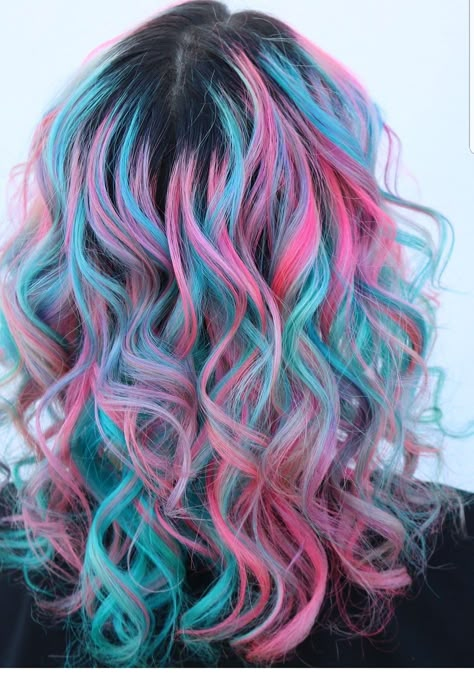 Love this pink and blue hair. The curls really make the color pop.  #hairstyles #pinkhair #bluehair #dyedhair #haircolors Cotton Candy Colored Hair, Hair Color Blue And Pink, Blue And Pink Hair Color, Pink And Blue Tips Hair, Pastel Color Hair Ideas, Mermaid Colored Hair, Hair Color Ideas Crazy, Cotton Candy Hair Color Pastels, Pulpriot Haircolor Ideas